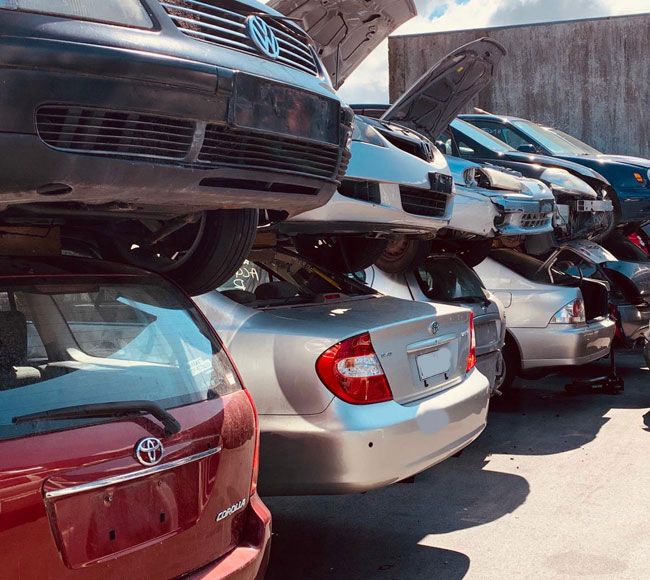 A mound of scrap cars, representing Same Day Junk Car Removal in Brisbane.
